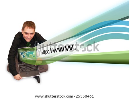 A business man is sitting on a white, isolated background holding a laptop with an internet address projected out of the computer.