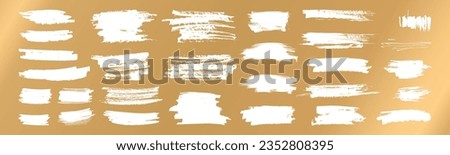 Vector hand drawn scratches for lottery scratch and win tickets design. Various shapes grungy casino gambling card elements. White brush stroke scribble textures isolated on shiny golden background