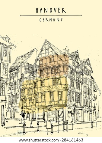 View of old center in Hanover, Germany, Europe. Historical building line art. Freehand drawing with liner pen and pencils on paper. Travel sketch with hand lettering. Postcard graphic design template