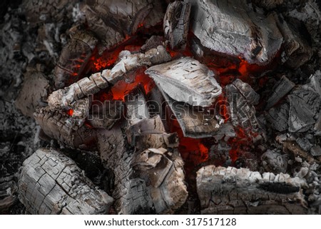 Close-up extinguish fire coal in stove