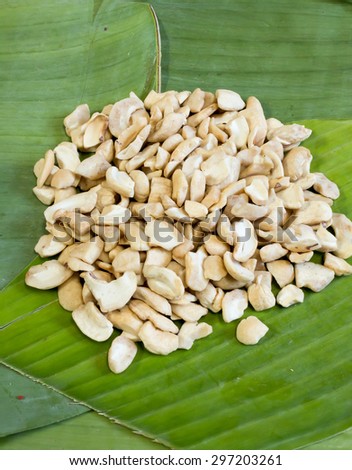 A pile of cashew view from top on the banana leaf background