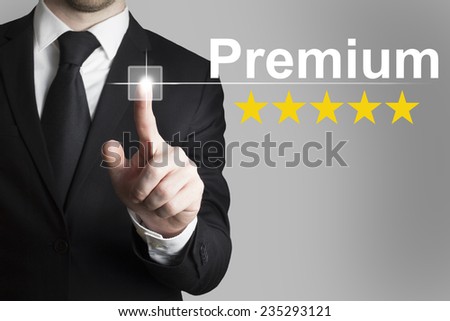 businessman in black suit pushing flat button premium five stars