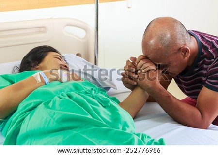 Husband pray for his wife recover from illness.