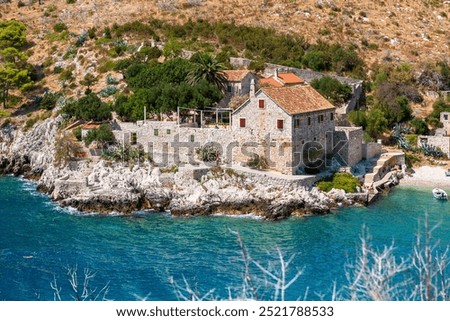 Similar – Image, Stock Photo Stone house located on rocky mountain in winter time at sunset