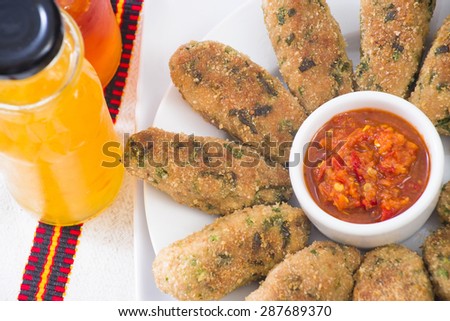 Pork cutlets with hot, sweet, yellow sweet sauces