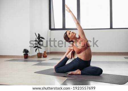 Similar – Image, Stock Photo Woman practicing pilates pose Cobra in park on summer