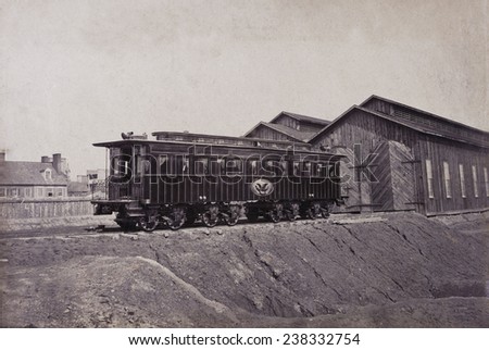 President\'s rail car at the Alexandria station, the car was later used as Lincoln\'s funeral car, President\'s car, Alexandria, Virginia, photograph by Andrew J. Russell, circa January, 1865.