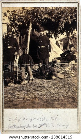 The Civil War. Freed slaves (\'contrabands\') in the camp of the 2nd Regt. Rhode Island Volunteer Infantry. Washington, DC. cabinet card ca. 1861-1864