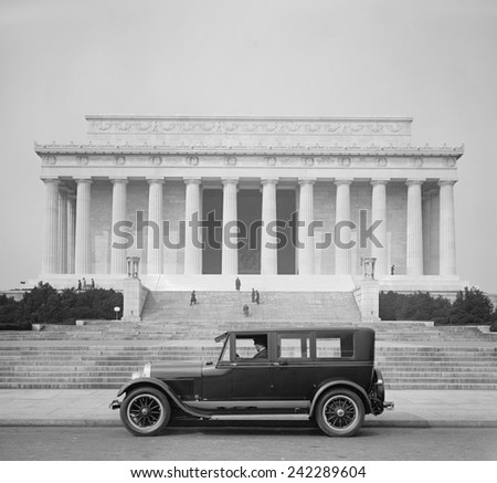 A Lincoln coupe, Ford Motor Company\'s luxury, offering parked at the Lincoln Memorial in Washington D.C. Ca. 1925.