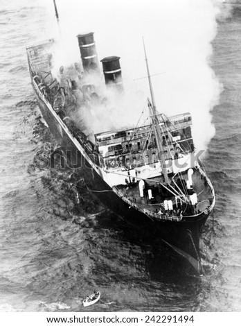 Luxury Liner Morro Castle, smoldering off Asbury Park, New Jersey. On its final Havana to New York voyage, a storm and ship fire resulted in the death of 135 passengers and crew. September 1934.