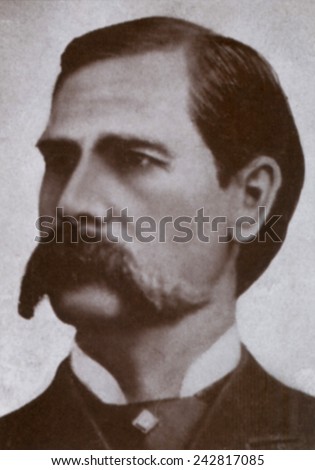 Wyatt Earp (1848-1929), legendary Western hero of many trades, including lawman, gamble, saloon-keeper. Earp has been the subject of many movies.