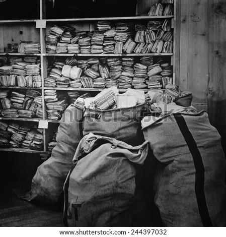 Mail piled up at the International Red Cross central information bureau for prisoners of war. Nov. 1940.