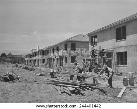 Houses under construction at the Navy defense housing project for enlisted men in the Marines and Navy. San Diego, California. May 1941 photo by Russell Lee.