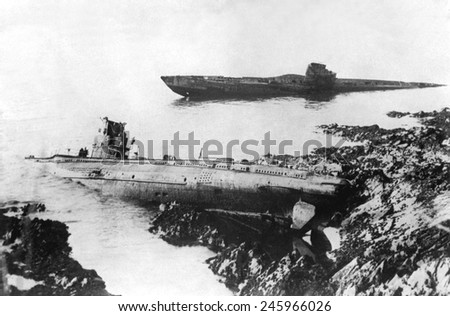 Two German U-boats washed up on the rocks at Falmouth, England, in 1921. Both were sunk during WWI.