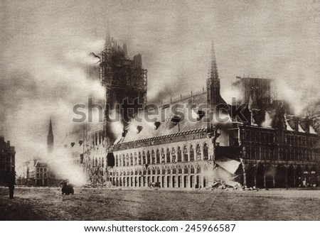WWI. The medieval Cloth Hall of Ypres, Belgium, in flames from artillery fired by the Germans during the First Battle of Ypres. November 1914.