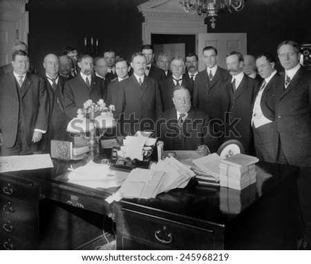 President William H. Taft in the Oval Office signing Arizona Statehood Bill admitting the 48th state on February 14 1912. The Arizona state constitution granted its women citizens the right to vote.