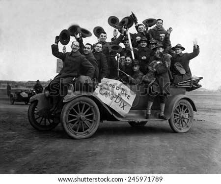 At least sixteen soldiers in a car after being mustered out at Camp Dix, New Jersey, after the Nov. 11, 1918 Armistice ended WWI.