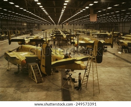 B-25 bombers on the assembly line at North American Aviation during World War 2. Kansas City, during World War 2, Oct. 1942.