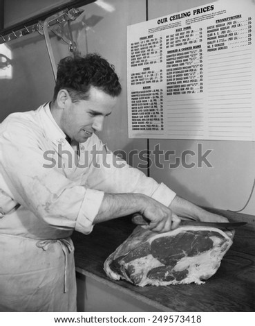 Ceiling prices on meats are posted by an American butcher during World War 2. From 1942 until 1946, meat prices were controlled by the Office of Price Administration.