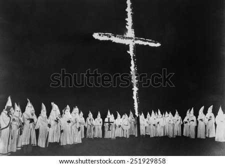 Ku Klux Klan at a cross burning in Tennessee. Sept. 4, 1948. The Klan is protesting Progressive presidential candidate Henry Wallace campaigning in Knoxville, Tennessee. Sept. 4, 1948.