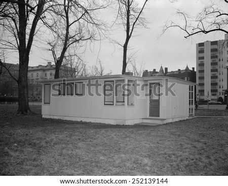30,000 prefabricated house to be shipped to Great Britain under lend-lease in 1945. The house has a kitchen entrance (facing camera) and front entrance.