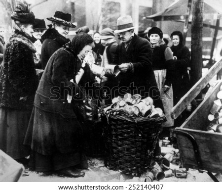 Berlin, Germany, the selling of tin cans in the street, an indication of terible inflation in the economy, 1923