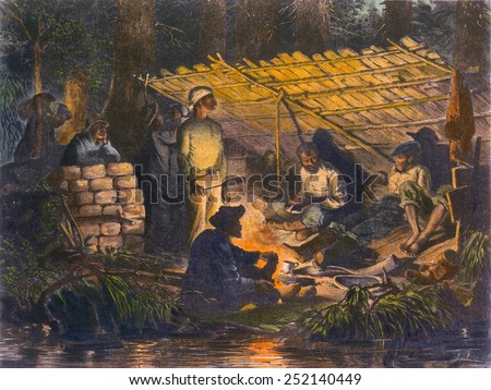 Ex-slaves hiding in the swamps of Louisiana. Some African American men chose exile in the wilderness or Indian territories. 1873. 19th century engraving with modern color.