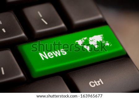 A news key button on laptop white keyboard