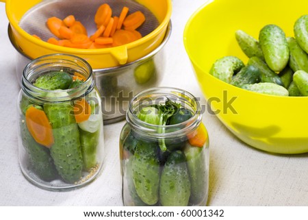 Pickled cucumbers and carrots prepared at home
