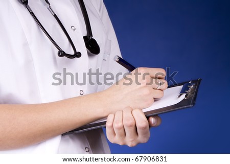 Healthcare professional, doctor or nurse, writing with a fountain pen on a paper over a folder.