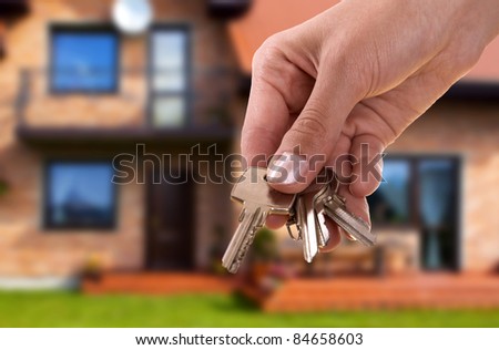 handing keys in the house background