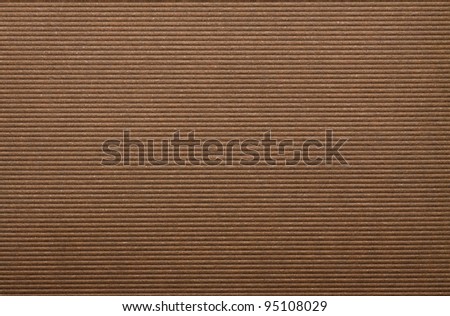 Brown corrugated paper cardboard texture background.