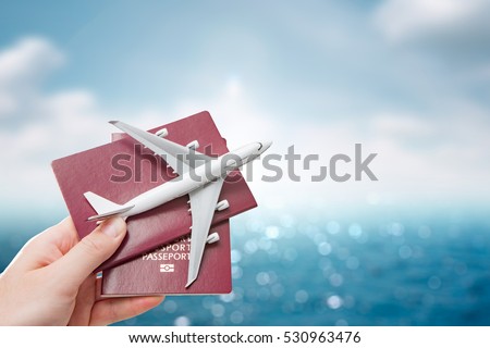 stock-photo-airplane-passport-flight-tra