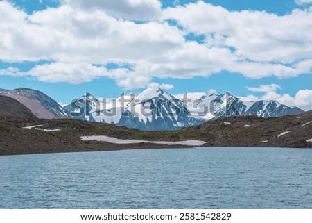 Similar – Image, Stock Photo Mountain lake against mountain backdrop