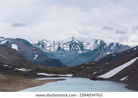 Similar – Image, Stock Photo Mountain lake against mountain backdrop