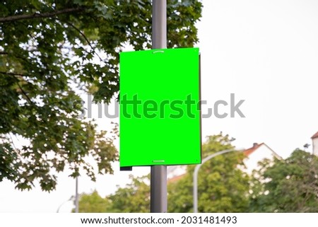 Similar – Image, Stock Photo Election poster, billboard for election advertising on the street framed by trees. Inscription