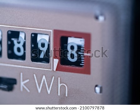 Close-up electricity meter. Measuring used electricity in kWh ( kilowatt hour ) Сток-фото © 