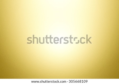 Abstract golden gradient paper skin background.