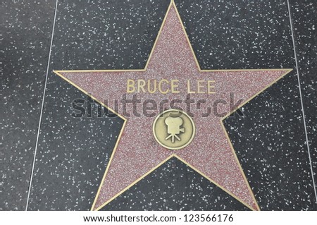 HOLLYWOOD - DECEMBER 7: Bruce Lee\'s star on Hollywood Walk of Fame on December 7, 2012 in Hollywood, California. This star is located on Hollywood Blvd. and is one of 2400 celebrity stars.