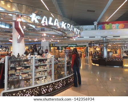 DELHI, INDIA - DECEMBER 12: Duty Free Shops at Terminal 3 at Indira Gandhi International Airport in Delhi, India, on December 12, 2011. Terminal 3 is the world\'s 8th largest passenger terminal.