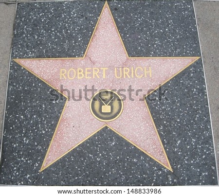 HOLLYWOOD - JULY 11: Robert Urich\'s star on Hollywood Walk of Fame on July 11, 2013 in Hollywood, California. This star is located on Hollywood Blvd. and is one of 2400 celebrity stars.