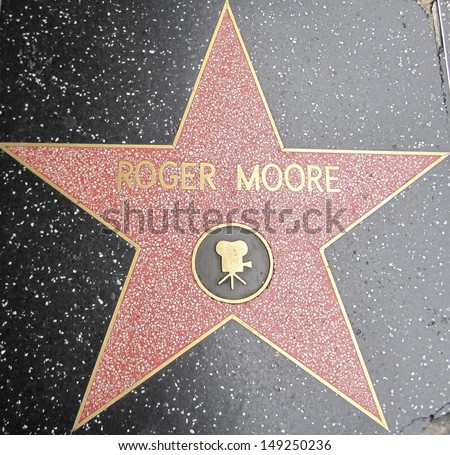 HOLLYWOOD - JULY 11: Roger Moore\'s star on Hollywood Walk of Fame, as seen on July 11, 2013 in Hollywood, California. This star is located on Hollywood Blvd. and is one of 2400 celebrity stars.