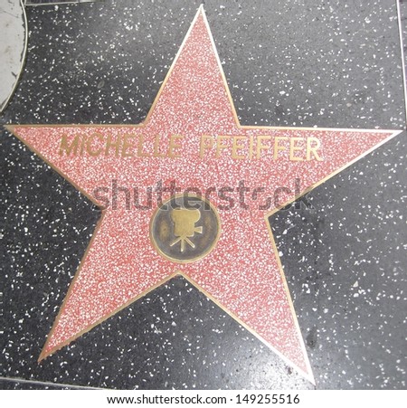 HOLLYWOOD - JULY 11: Michelle Pfeiffer\'s star on Hollywood Walk of Fame, as seen on July 11, 2013 in Hollywood, California. This star is located on Hollywood Blvd. and is one of 2400 celebrity stars.