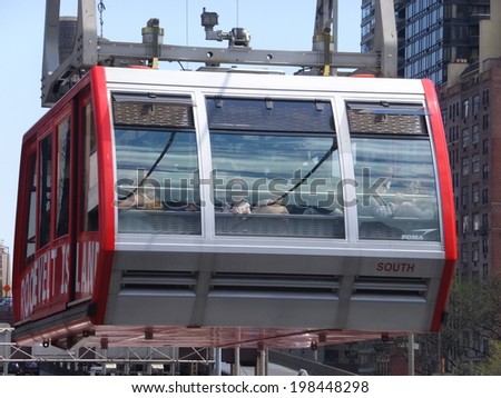 NEW YORK CITY - MAY 3: Roosevelt Island cable tram car that connects Roosevelt Island to Manhattan in New York, as seen on May 3, 2014.