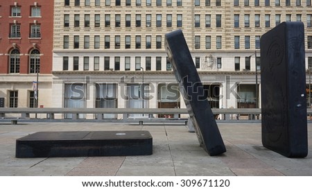 PHILADELPHIA, PA - MAY 9: Dominoes at Your Move Board Game Art Park in Philadelphia, as seen on May 9, 2015. Scattered on the Municipal Services Building plaza are oversized game pieces.