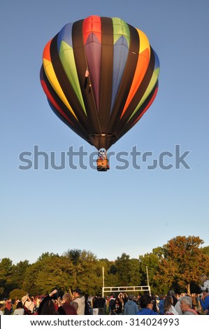 PLAINVILLE, CT - AUG 29: Balloon launch at dawn at the 2015 Plainville Fire Company Hot Air Balloon Festival held from August 28-30, 2015. Thousands of people attended this festival in its 31st year.