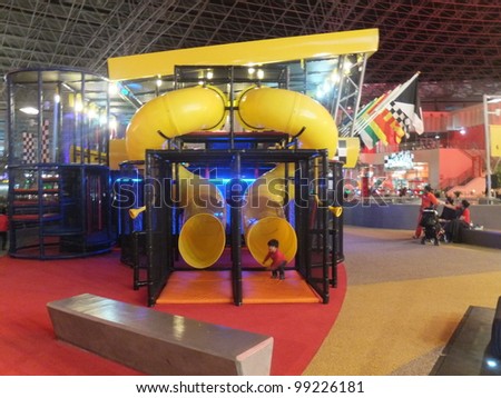 ABU DHABI, UAE - DEC 22: Children\'s play area at Ferrari World at Yas Island in Abu Dubai in the UAE on December 22, 2011. Ferrari World is the largest indoor amusement park in the world.