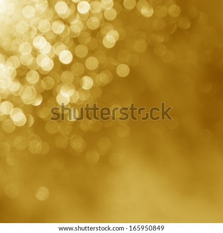 Gold lights background Beautiful shine of a holiday light