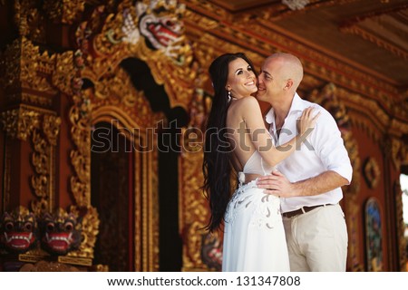Couple on exotic wedding in hindu temple, bali, indonesia