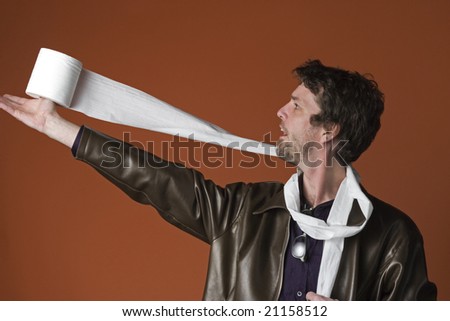 A man enjoys fooling around with a roll of toilet paper in an improvisation with a surprise prop
